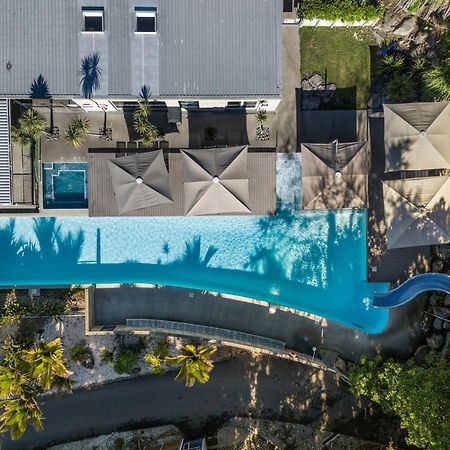 Tasman Holiday Parks - Waihi Beach Kültér fotó Aerial view of the pool