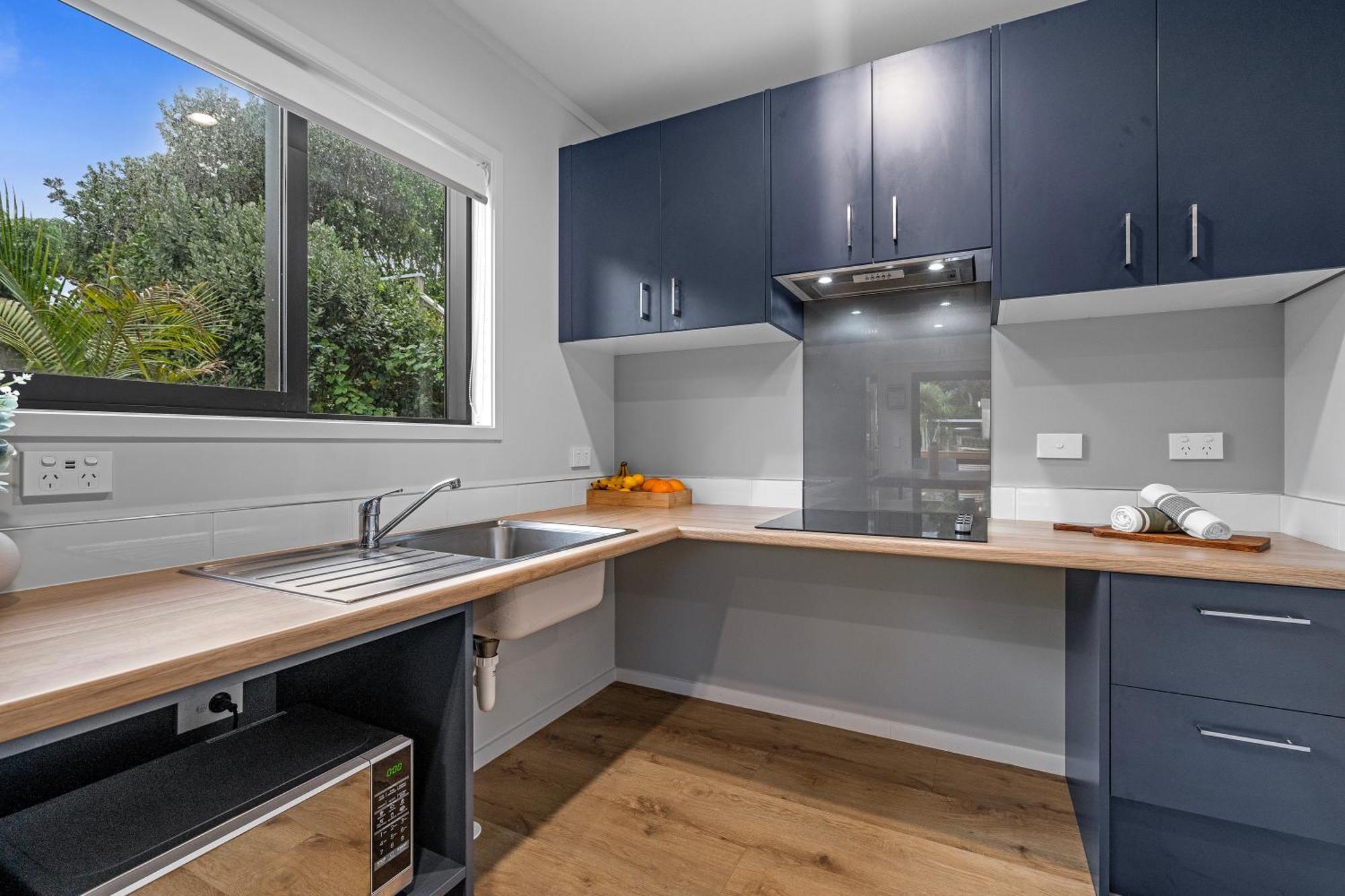 Tasman Holiday Parks - Waihi Beach Kültér fotó A modern kitchen